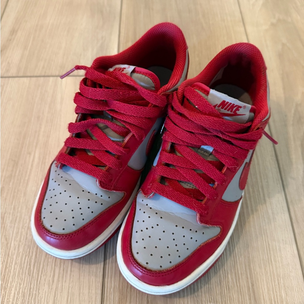 UNLV Dunk Low size 4Y, no box 
Nike Kids Red and Gray Sneakers